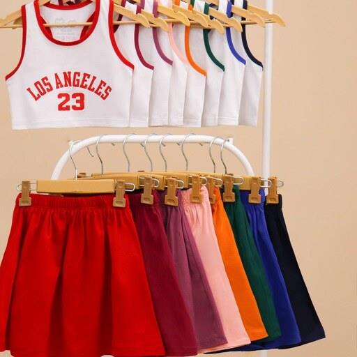 ست کراپ و دامن دخترانه سایز 2 تا 9 سال دارای رنگ بندی متنوع